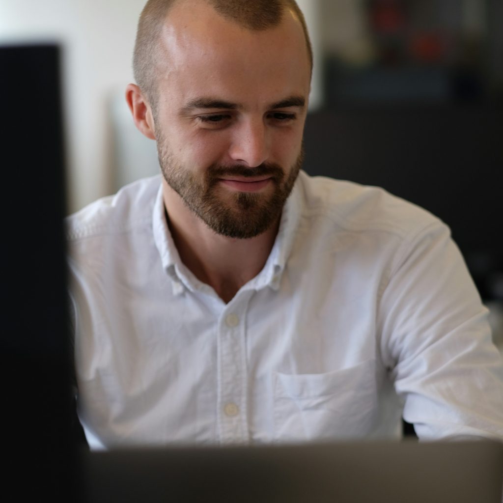 Accessibility professional working at their computer